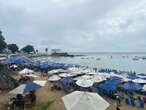 Deu praia em Salvador: chuva rápida não afasta banhistas do Porto da Barra