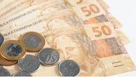Desigualdade cai ao menor nível histórico, mas endividamento trava consumo das famílias