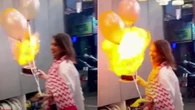 Balões pegam fogo durante parabéns e atingem rosto de mulher em festa de aniversário