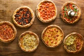 Quantas fatias de pizza você precisa comer para 'dar prejuízo' no rodízio? A conta pode surpreender