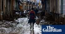 Spain floods: military unit searches car parks and malls amid fears death toll will rise