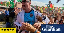 Kneecap at Glastonbury review – sunkissed good vibes are banished by rap trio’s feral, furious flows