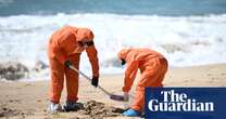 Sydney beaches reopen after tar balls wash ashore but mystery remains over source