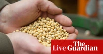 China ends tariffs on US imports including farm goods but soy bean levies remain; M&S profits hammered by cyber-attack – business live