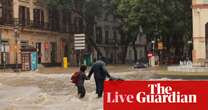 Spain floods: rescue workers search for survivors but death toll expected to rise – latest updates