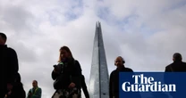 UK unemployment shows surprise fall to 4.9% as pay growth drops to lowest in five years