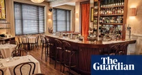 One Club Row, London E1: ‘Battered stuff, things in buns, strong drinks: a thrilling, retro ride’ – restaurant review | Grace Dent on restaurants