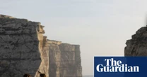 ‘That’s when the shark fins appeared’: your horrifying holidays – from natural disasters to missile threats