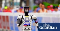 Humanoid robots race past humans in Beijing half-marathon – video