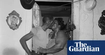 A husband and wife kiss in a doorway: Baldwin Lee’s best photograph