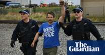 Activists board coal train as Albanese government approves three coalmine expansions – video