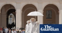 Behold the sunbrella, fashion’s stealth accessory for a heatwave