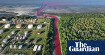 River near Buenos Aires turns bright red after suspected industrial dye leak