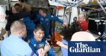 SpaceX capsule docks with ISS to bring back stranded Nasa astronauts – video