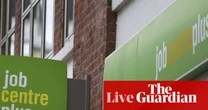 UK wage growth slows as jobs market continues to cool – business live