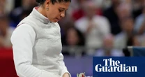 French fencer cleared of doping charge on account of kissing her American partner