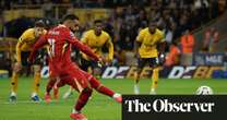 Mohamed Salah’s penalty sees off battling Wolves to send Liverpool top