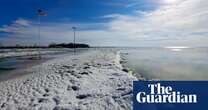 Vanishing ice and snow: record warm winter wreaks havoc across US midwest