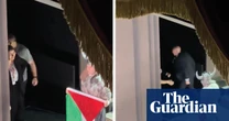 Cast member displays Palestinian flag at end of Royal Opera House performance