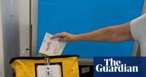 US judge blocks Trump bid to limit mail-in voting in latest setback for president