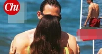 Melissa Satta in bikini con Carlo, le foto al mare: passione travolgente tra le onde | Guarda