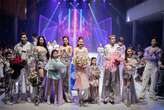 Khách mời đội mưa đến dự Vietnam Future Fashion Show 2024 của NTK Kim Phụng