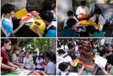 Sĩ tử tấp nập đến trường đại học đầu tiên ở Việt Nam để cầu may trước kỳ thi tốt nghiệp