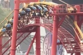 Horror as thrill-seekers left dangling on rollercoaster 100m in air as storm cuts power