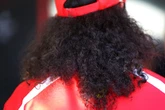 Lewis Hamilton lets it all hang out as he shows off his lush long locks at Barcelona Grand Prix