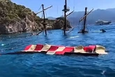 Pirate-themed party boat sinks with Brits on board as rescue teams save all 148 passengers