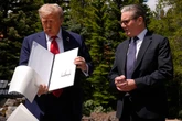 Donald Trump confirms US-UK trade deal 'is done' after accidentally dropping papers