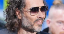 Russell Brand pleads not guilty to sex offence charges as he appears in court