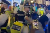 Officer 'hit with glass bottle' as London chaos erupts after Morocco World Cup exit