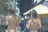 'Naked' joggers put on eye-popping display on busy street to honour popular band