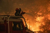 Entire city could be evacuated as deadly wildfires sweep across nation