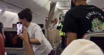 Screaming plane passenger 'refuses to wear seatbelt' and causes flight delay