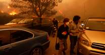 Horror Los Angeles wildfires tear through city as thousands fleeing for lives trapped in gridlock