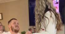 Romantic proposal has people in stitches as they can't help staring at what's behind them