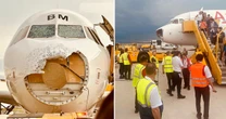 Plane's nose ripped apart as it's battered by hailstorm with passengers terrified