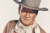 Walking with John Wayne swagger makes men appear 'tough and more confident'