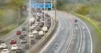 LiveM62 UPDATES as motorway closed after man dies in police chase horror crash