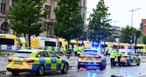 Liverpool parade crash leaves four children injured as one trapped under vehicle