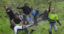 LiveCooper's Hill cheese rolling festival LIVE: Bizarre chase to see dare devils hurtle down hill
