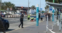 BREAKING: Knifeman shot by police outside holiday hotspot airport after lunging at officer
