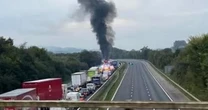 LiveM5 LIVE: Huge traffic queues with truck 'fully on fire' as motorway closed