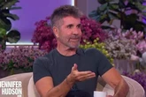 Simon Cowell baffles fans with his 'awkward' clapping as he graces the iconic 'spirit tunnel'