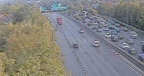 LiveM60 closure UPDATES: Huge delays on major UK motorway after 'police incident'