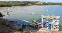 Tragedy as toddler dies after 'slipping from dad’s arms going down slide' at waterpark