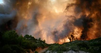 Apocalyptic wildfire images show Europe choked with smoke as blaze turns deadly