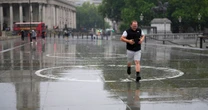 Summer is OVER! Fuming Brits battered by torrential rain and thunderstorms in staggering scenes